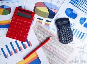 two-calculators-a-pencil-and-charts
