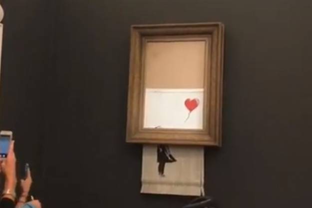 Una obra de Banksy se autodestruye justo después de ser subastada por más de un millón de euros 4